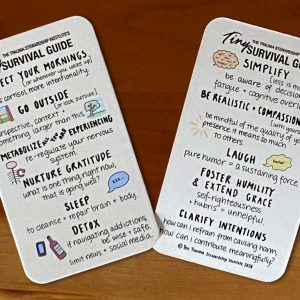 Tiny Survival Guide Wallet Size Card on Wooden Background